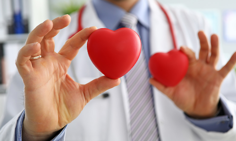 GP showing two red hearts in camera close-up
